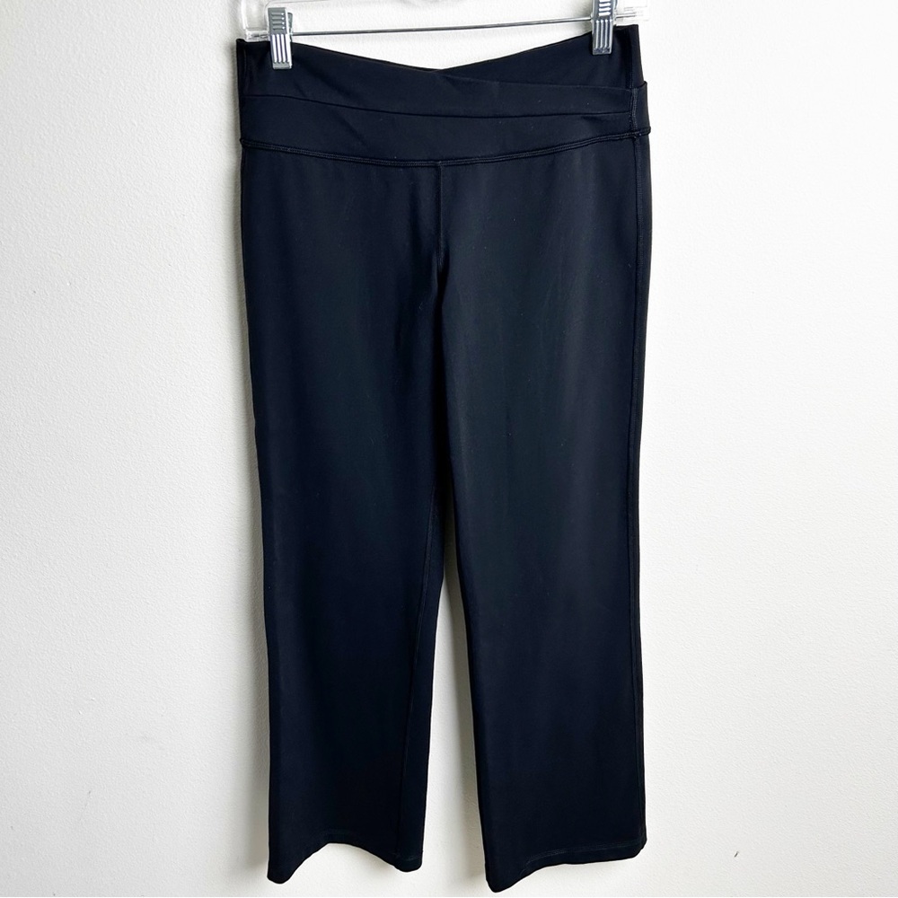 Lululemon mid-rise slight flare black cross waist leggings size: 8